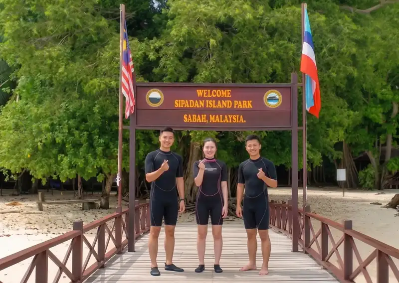Chinese tourists enjoying a visit to Sipadan Island Sagittarius Resort